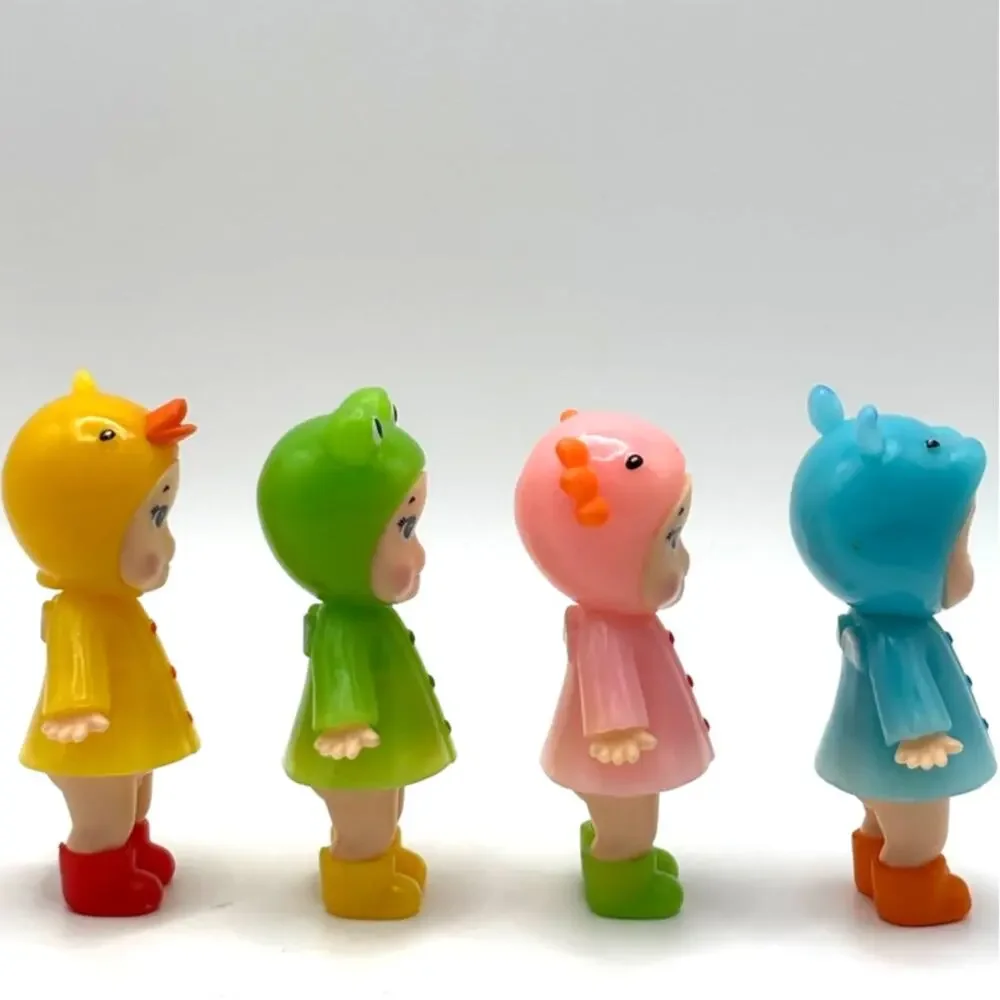 Set of 4 New Unbranded Kewpie/Angle Mini Figures, Rainy Day Costumes, Open Box